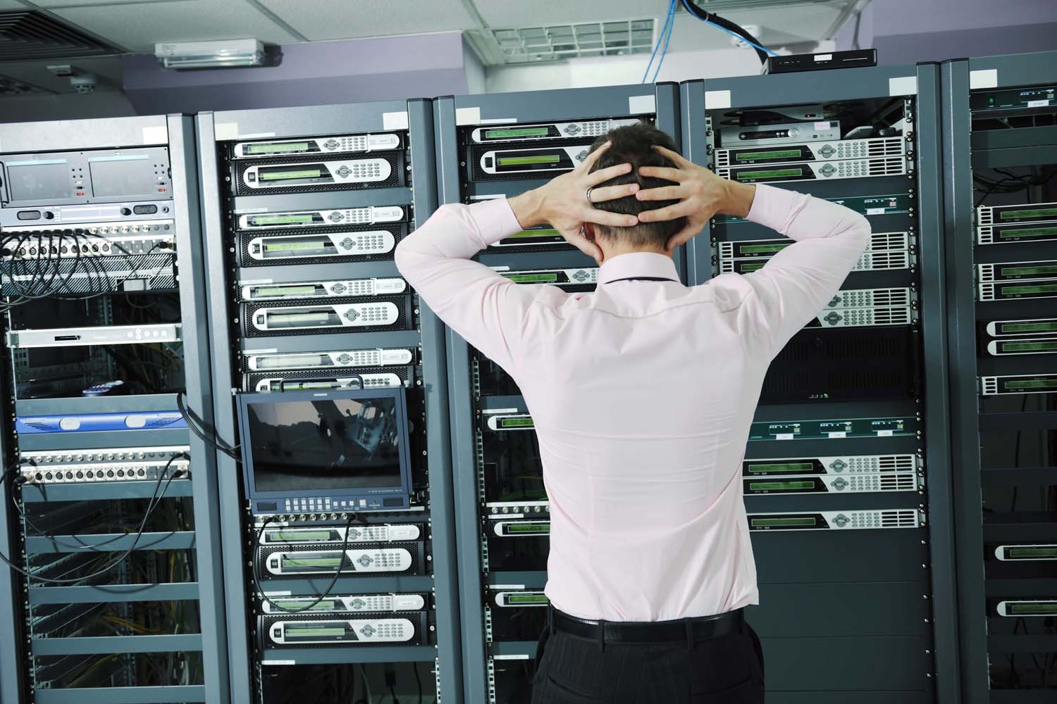concerned man in server room