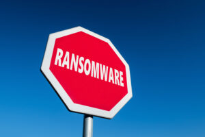 Stop,sign,with,a,text,ransomware,to,cease,malware,attacks